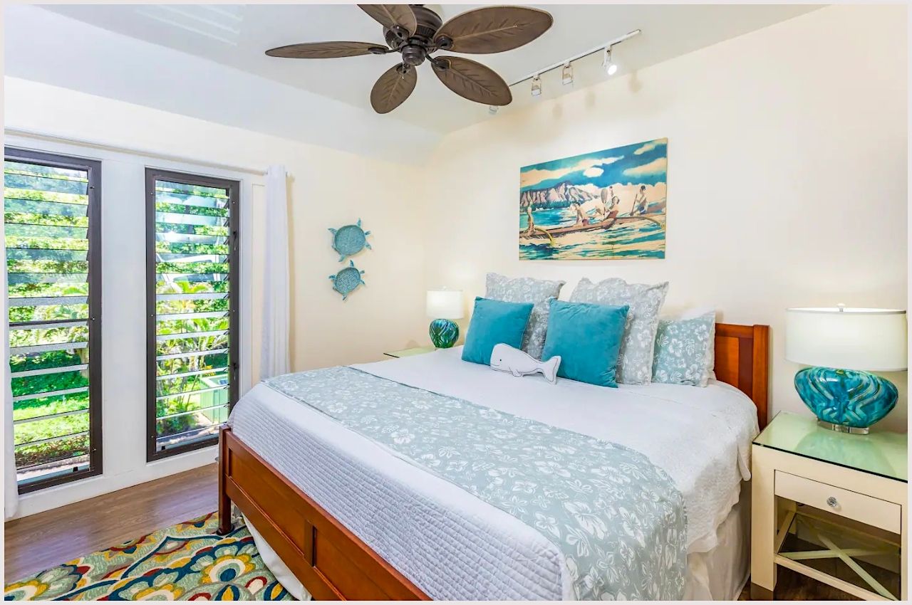 bedroom with fan inside airbnb near lihei